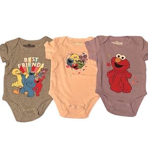 NWT. Set of three Sesame Street onesies.